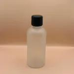 100ML Glass Round Bottle Frosted Pilfer Proof Cap Black Smooth With Plug for personal care packaging