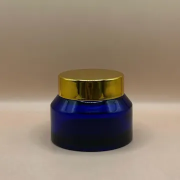50GM Slant Shoulder Glass Jar with Golden Cap - Premium Cosmetic & Skincare Packaging