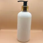 300ML PET Boston Bottle White with 24/410 L1 Black Dispenser with Golden Accents | Premium Skincare & Hair Care Packaging