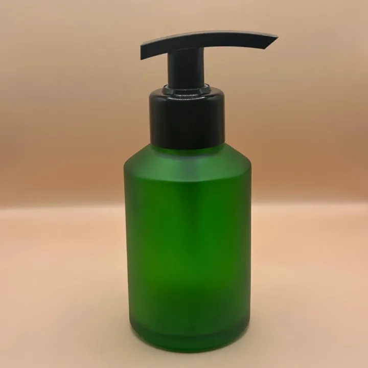 100ML Slant Shoulder Bottle Frosted Green for skincare packaging