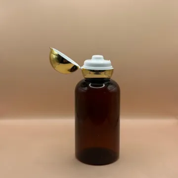 100ML PET Boston Bottle With 24/410 Dom Flip-Top Cap Golden Coating | Elegant Packaging for Personal Care