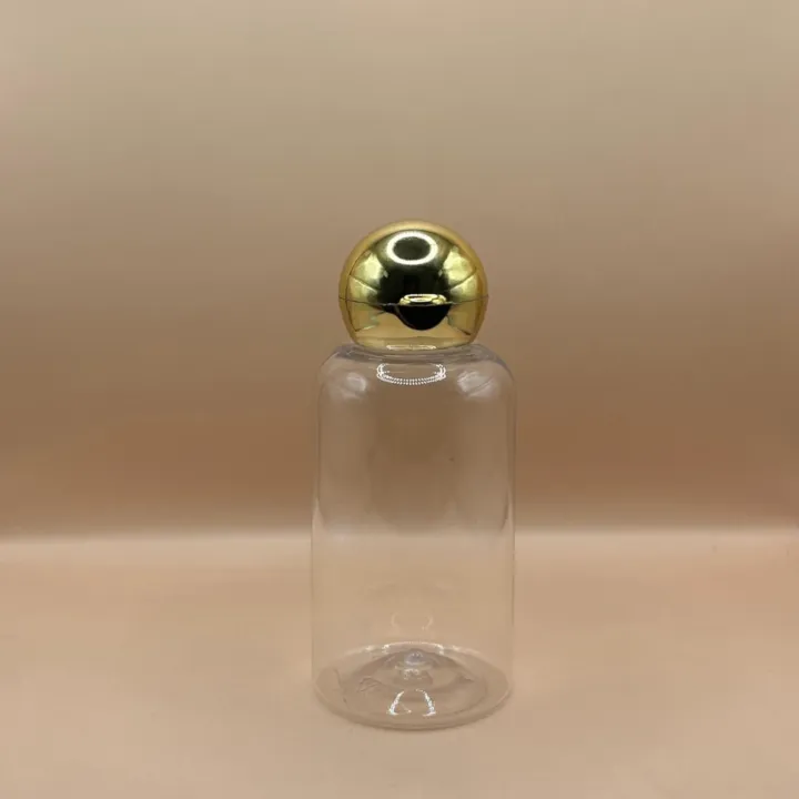 100ML PET Boston Bottle With 24/410 Dom Flip-Top Cap Golden Coating | Elegant Packaging for Personal Care