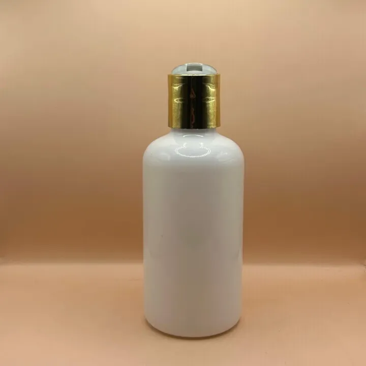 200ML PET Boston Bottle with 24/410 Dis-Top Cap Golden Coating | Premium Cosmetic Packaging