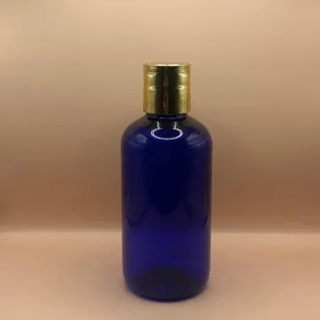 200ML PET Boston Bottle with 24/410 Dis-Top Cap Golden Coating | Premium Cosmetic Packaging