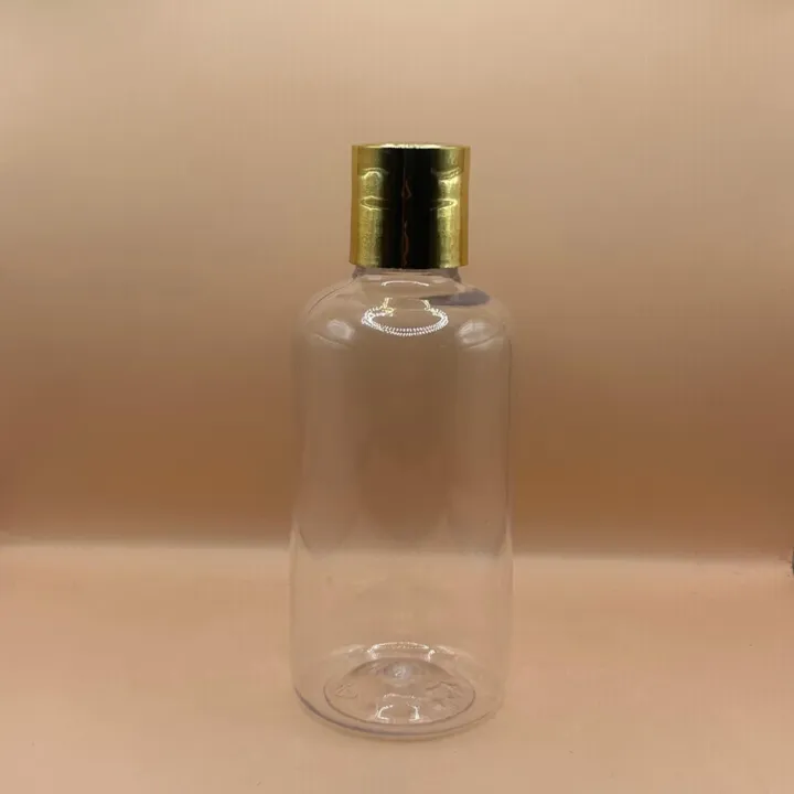 200ML PET Boston Bottle with 24/410 Dis-Top Cap Golden Coating | Premium Cosmetic Packaging